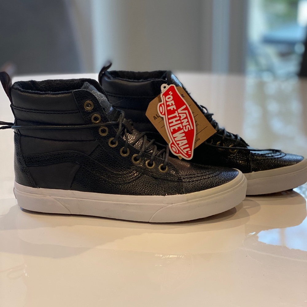 Vans black all weather high top sneakers
